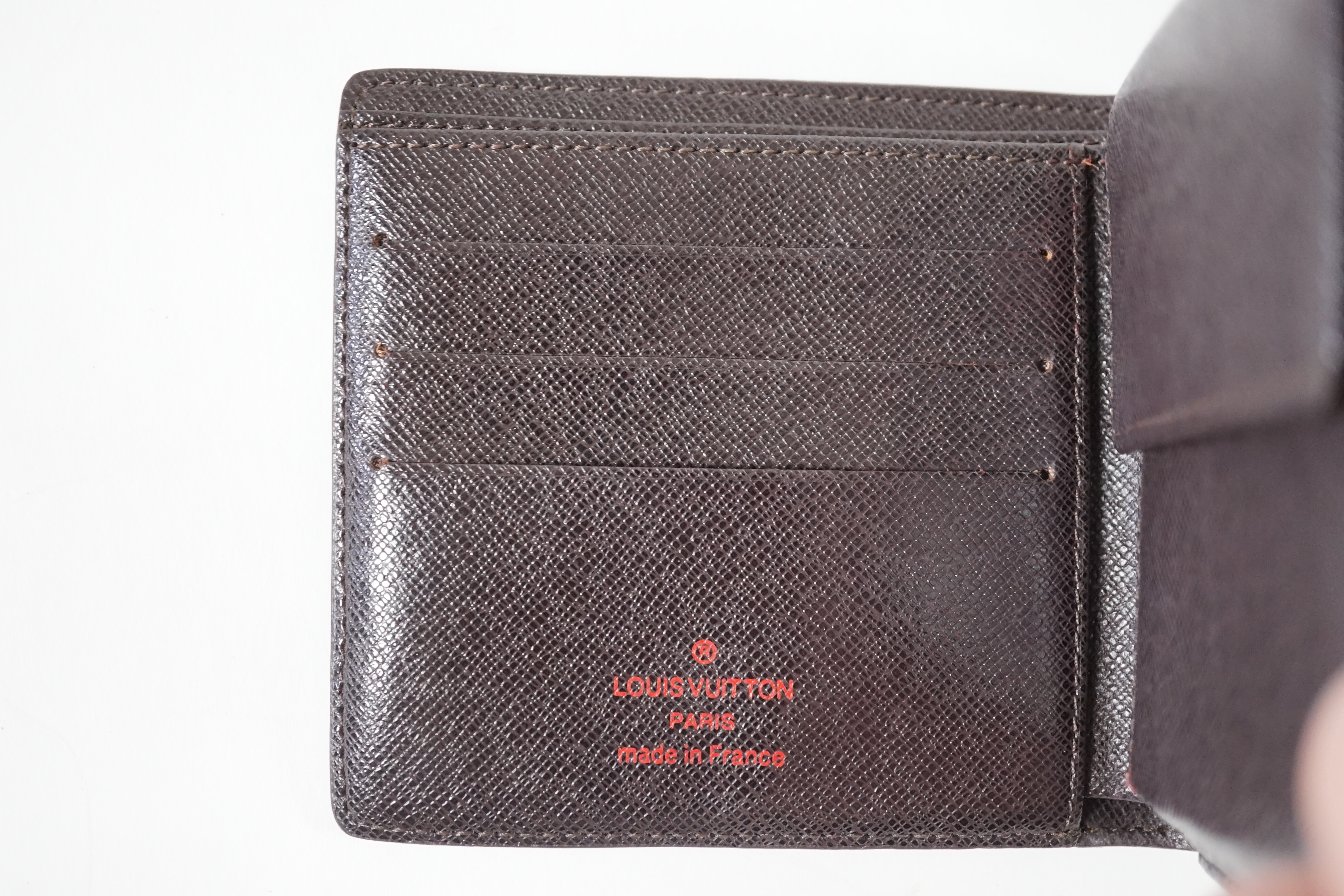 A Louis Vuitton bifold Damier coated canvas Marco wallet, height 10cm, width 11cm